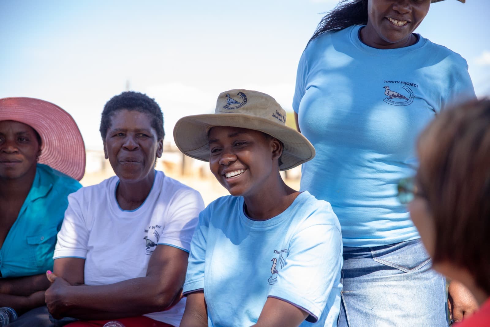 Trinity Project beneficiaries at a home visit.